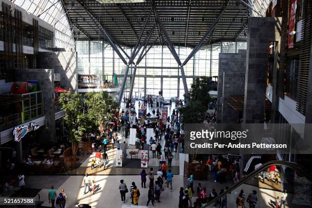 Shoppers inside a mall on May 1, 2013 at Maponya shopping Mall, Soweto, South Africa. Maponya is one of several new shopping malls in the township....