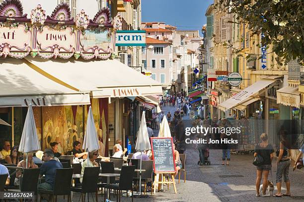 cafe and street in antibes - antibes stock pictures, royalty-free photos & images