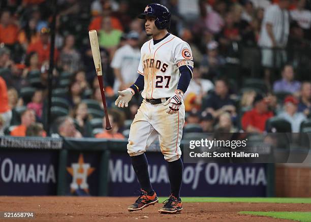 Jose Altuve of the Houston Astros reacts to stricking out to end the seventh inning of their game against the Detroit Tigers at Minute Maid Park on...