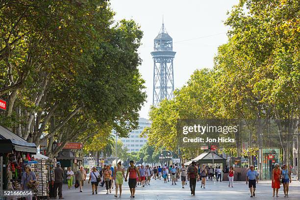 strollers on la rambla, barcelona. - the ramblas stock pictures, royalty-free photos & images