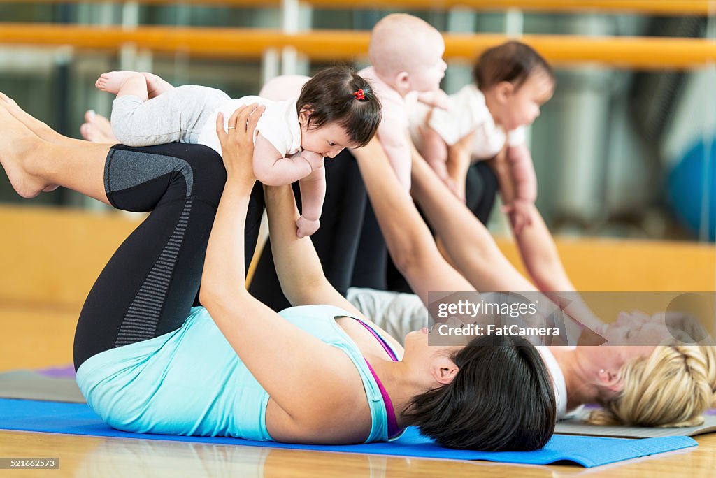 Babies and moms exercising
