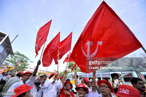 cpm electioneering arrangement with party flags and workers assembled at a place in kolkata, india - political party stock pictures, royalty-free photos & images