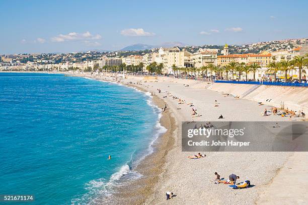 beach and promenade des anglais in nice - プロムナーデザングレ ストックフォトと画像