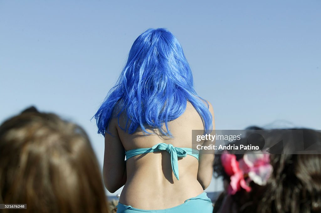 Blue-haired Mermaid in Crowd Watching Parade