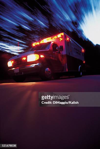 ambulance rushing in an emergency - ambulance bildbanksfoton och bilder