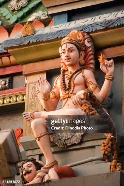 statue of lord shiva on temple, trivandrum thiruvananthapuram, kerala, india - shiva stock pictures, royalty-free photos & images