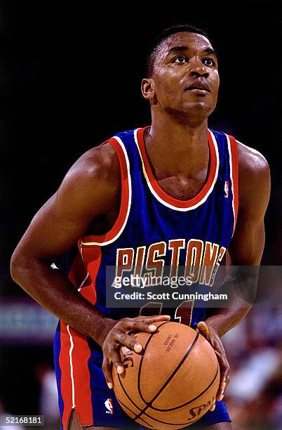 Isiah Thomas of the Detroit Pistons shoots a free throw against the Atlanta Hawks during an NBA game in 1990 at the Omni in Atlanta, Georgia. NOTE TO...