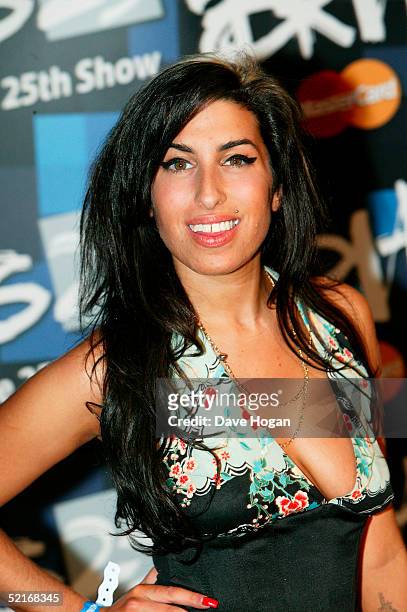 Musician Amy Winehouse arrives at the 25th Anniversary BRIT Awards 2005 at Earl's Court February 9, 2005 in London.
