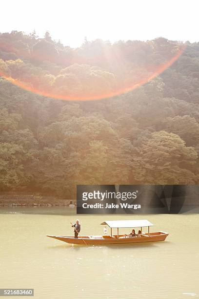 boat on lake, sunny day - jake warga stock pictures, royalty-free photos & images
