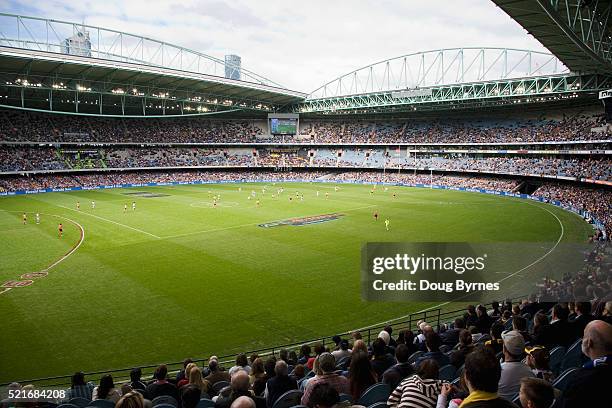 australian rules football game in melbourne - afl footy stock pictures, royalty-free photos & images