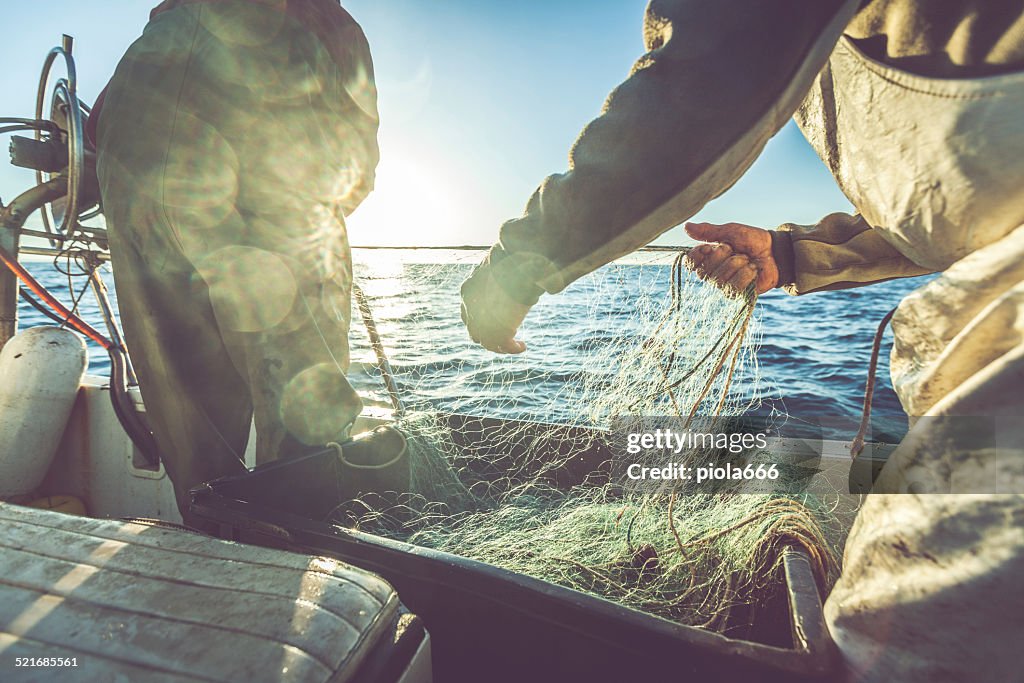Fishermen hands