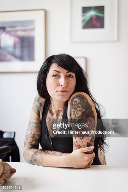 portrait of  a young tattooed woman - tattoos bildbanksfoton och bilder