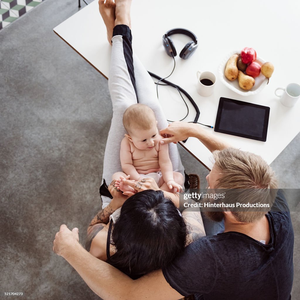 Young Family With Newborn Baby