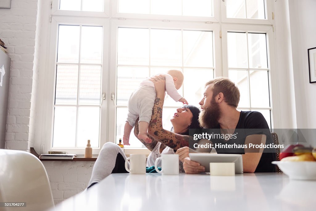 Young Family With Newborn Baby