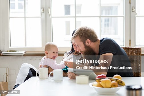 Young Family With Baby having Fun Young Family With Baby having Fun