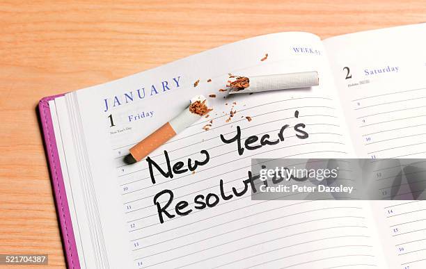 quit smoking new years resolution - new-year-resolution stock pictures, royalty-free photos & images