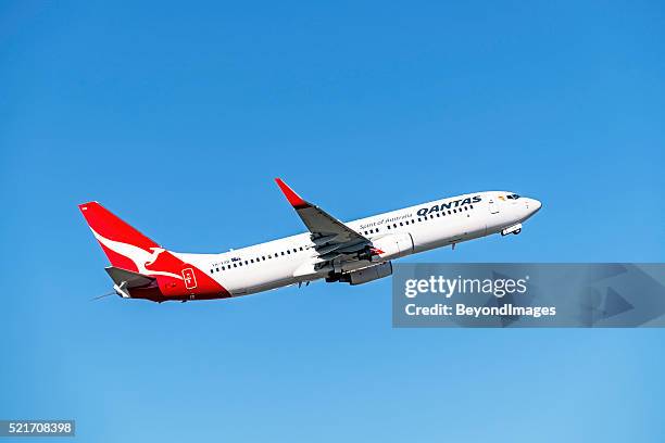 qantas plane taking-off from melbourne airport - qantas stock pictures, royalty-free photos & images