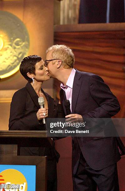 Lisa Stansfield kisses Chris Evans at the 25th Anniversary BRIT Awards 2005 at Earl's Court February 9, 2005 in London.