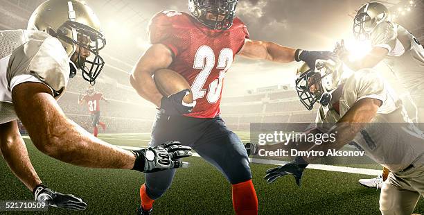 american football in action - touchdown quarterback stock pictures, royalty-free photos & images