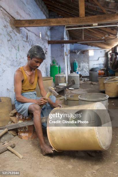 making of copper utensils in vessel manufacturing industry in anupparpalayam metal town, tirupur, tamil nadu, india - copper art india stock pictures, royalty-free photos & images