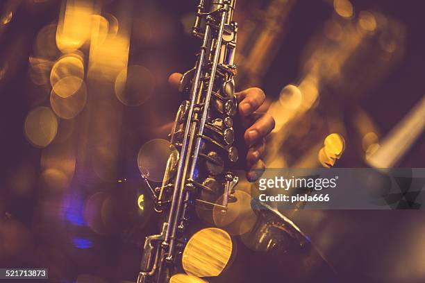 saxophone players - performance group stock pictures, royalty-free photos & images