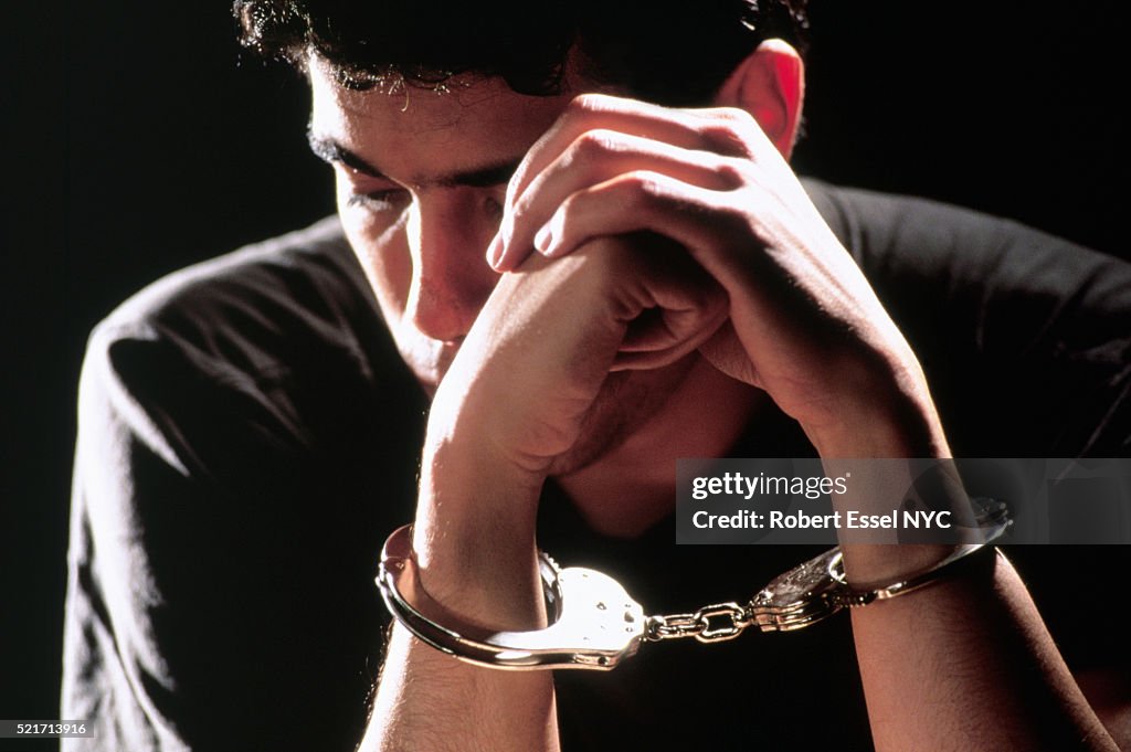 Teen in handcuffs