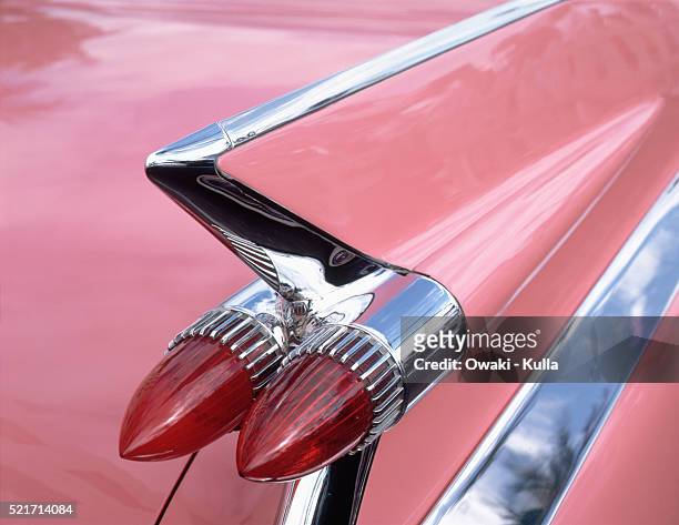 pink cadillac tail fin - rear light car stock pictures, royalty-free photos & images
