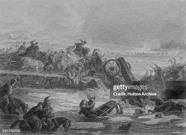 An engraving of soldiers of the French Grande Armee trying to cross the Berezina river from the pursuing Russian army at the Battle of Berezina on...