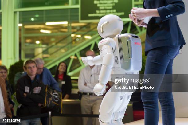 honda robot asimo - asimo stock pictures, royalty-free photos & images