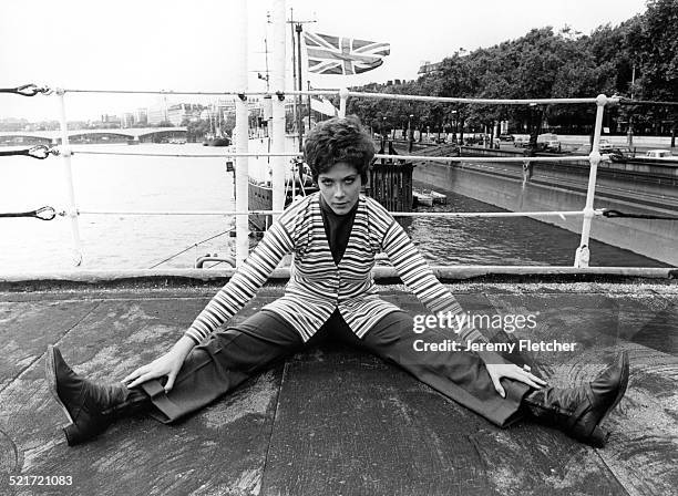 Canadian actress Linda Thorson on a boat moored on the River Thames in London, during a publicity photoshoot for the television series 'The...