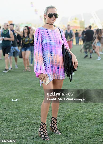 Music fan attends day 2 of the 2016 Coachella Valley Music & Arts Festival Weekend 1 at the Empire Polo Club on April 16, 2016 in Indio, California.