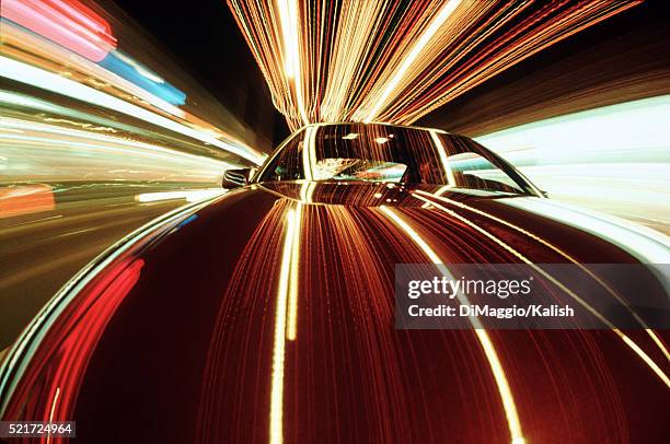 car and light streaks - high performance car stock pictures, royalty-free photos & images