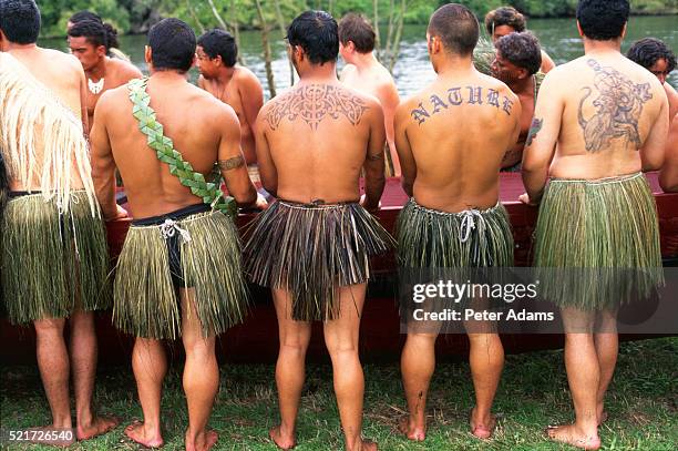maoris hauling canoe, new zealand - tribal water tattoo stock pictures, royalty-free photos & images