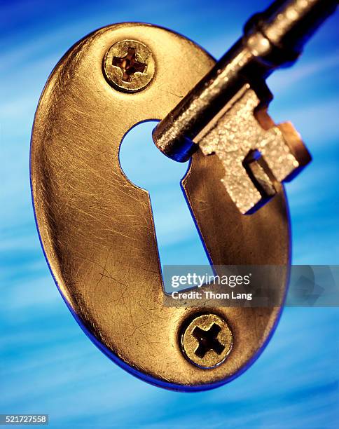 key and keyhole - key hole stock pictures, royalty-free photos & images