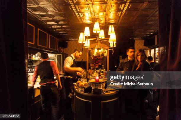 waiter prepare cocktail in a speakeasy bar - speakeasy stock pictures, royalty-free photos & images