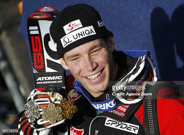 2nd placed Benjamin Raich of Austria poses on the podium after the Men's Giant Slalom at the FIS Alpine World Ski Championships February 10, 2005 in...