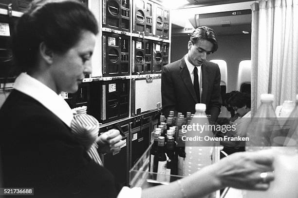 flight attendants preparing drink cart - air france stock pictures, royalty-free photos & images