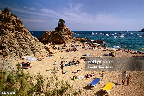beachgoers at platja de mar menuda - tossa de mar imagens e fotografias de stock