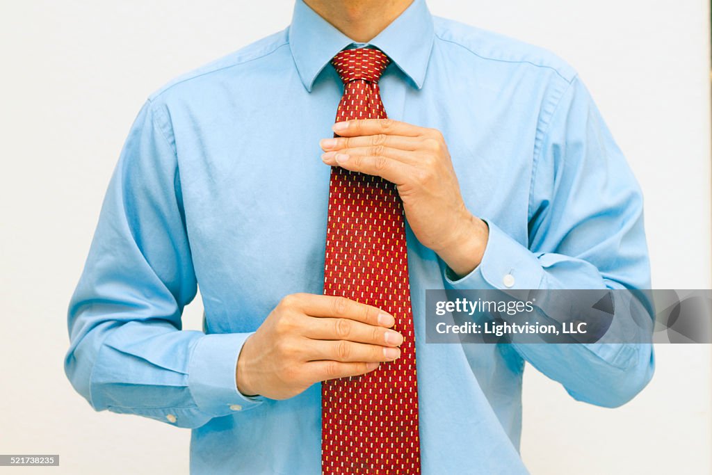 Red tie and blue shirt