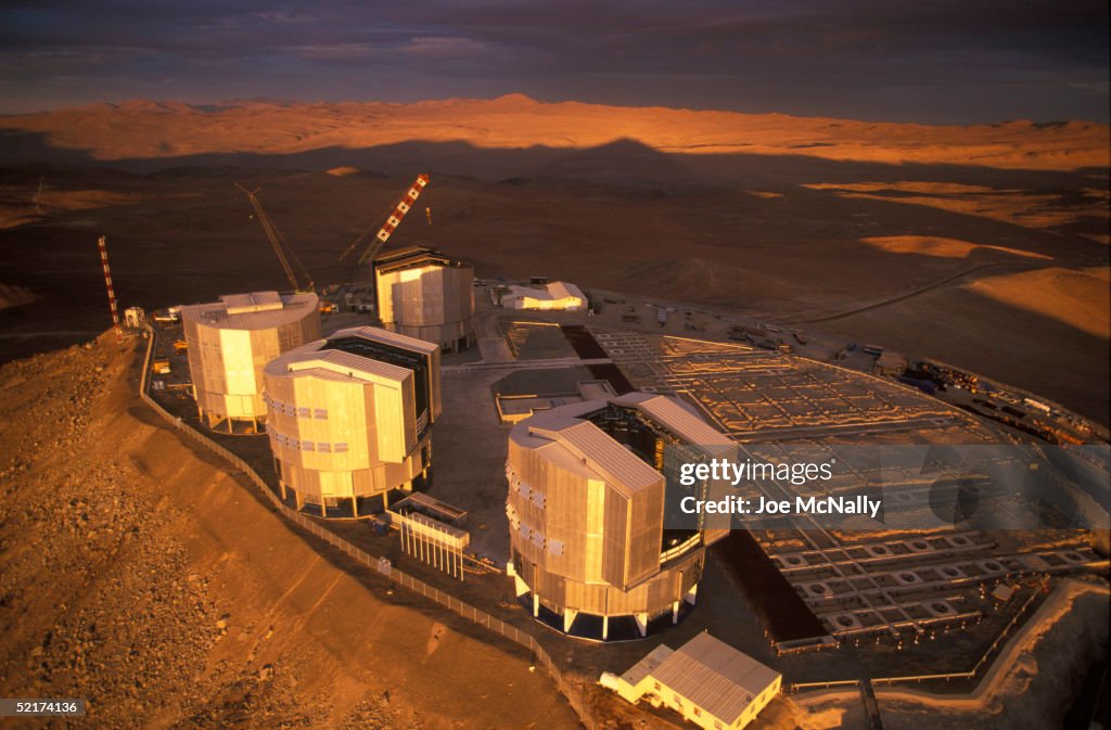 The sun sets on the Very Large Telescope which consists of these