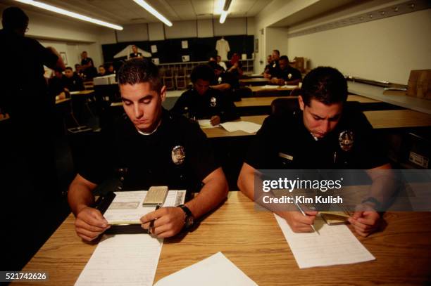 los angeles police at the newton precinct - newton area police station stock pictures, royalty-free photos & images