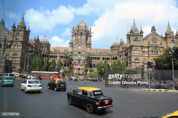 chhatrapati shivaji terminus at mumbai, maharashtra, india, asia - taxi stock pictures, royalty-free photos & images