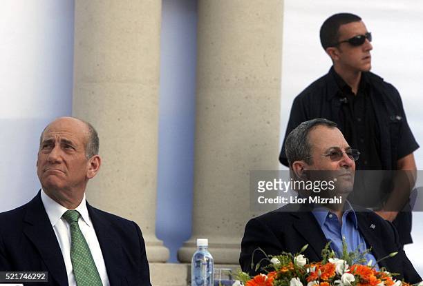 Israeli Prime Minister Ehud Olmert and Defence Minister Ehud Barak are seen during a ceremony on July 31, 2007 in Jerusalem, Israel.