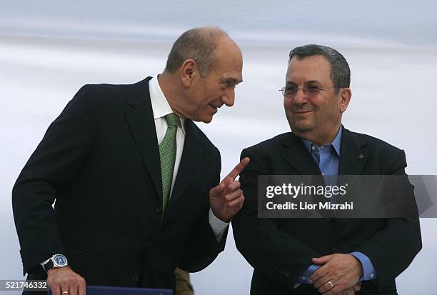 Israeli Prime Minister Ehud Olmert and Defence Minister Ehud Barak are seen during a ceremony on July 31, 2007 in Jerusalem, Israel.