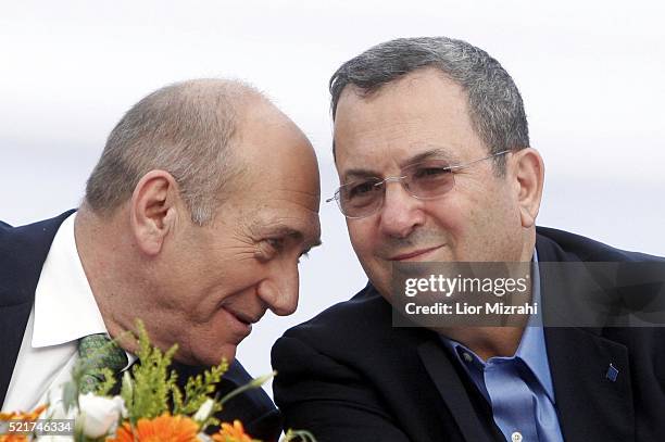 Israeli Prime Minister Ehud Olmert and Defence Minister Ehud Barak are seen during a ceremony on July 31, 2007 in Jerusalem, Israel.