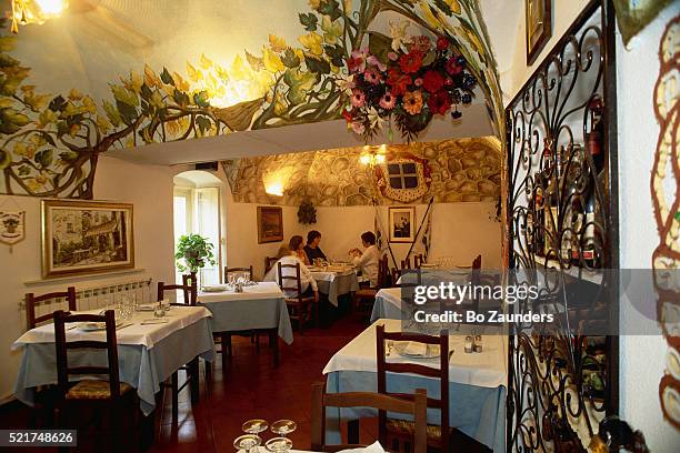 people dining at restaurant, hosteria del coniglio - wine rack stock pictures, royalty-free photos & images