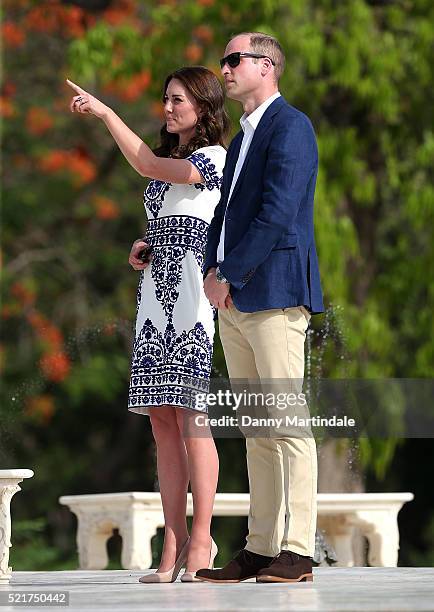 Prince William, Duke of Cambridge and Catherine, Duchess of Cambridge points at the Taj Mahal during there visit there on April 16, 2016 in Agra,...