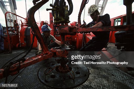 Oil Riggers Laboring