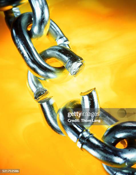 broken restraints - broken chain stock pictures, royalty-free photos & images