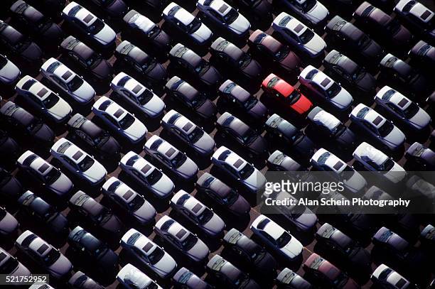 a special red car - parking lot stock pictures, royalty-free photos & images